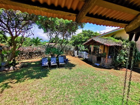 Hermosa Casa de 256m2, Con Rancho Estilo Típico 30m2, En una Extensión de 1007m2, Ubicado en La Garita de Alajuela, Antiguo Bosque Encantado. Cod 5677